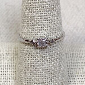 Sterling silver dainty band ring with 3 clear stones